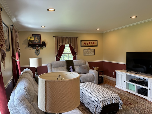25 Raccoon Rd, Cushing, ME 04563 - living room with crown molding, wood finished floors, and recessed lighting