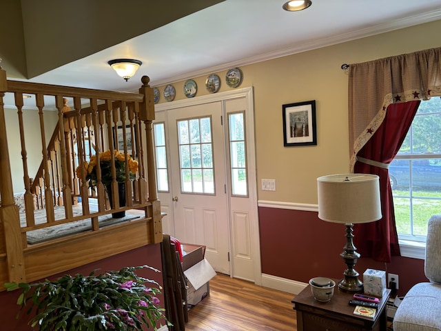 25 Raccoon Rd, Cushing, ME 04563 - foyer with wood finished floors, ornamental molding, and recessed lighting
