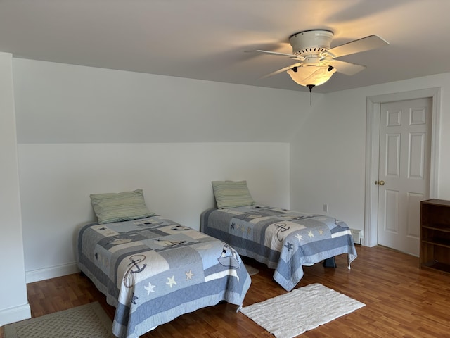 25 Raccoon Rd, Cushing, ME 04563 - bedroom featuring wood finished floors and a ceiling fan
