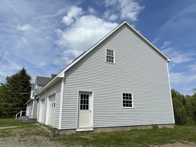 25 Raccoon Rd, Cushing, ME 04563 - view of side of property featuring a chimney