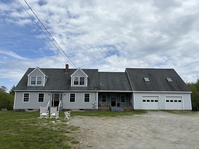 25 Raccoon Rd, Cushing, ME 04563 - new england style home with dirt driveway, a chimney, a garage, roof with shingles, and a porch