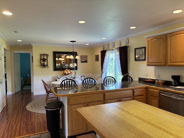25 Raccoon Rd, Cushing, ME 04563 - kitchen featuring tile counters, stainless steel dishwasher, a peninsula, recessed lighting, and a wainscoted wall