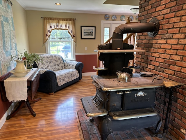 25 Raccoon Rd, Cushing, ME 04563 - living area featuring plenty of natural light, wood finished floors, and ornamental molding