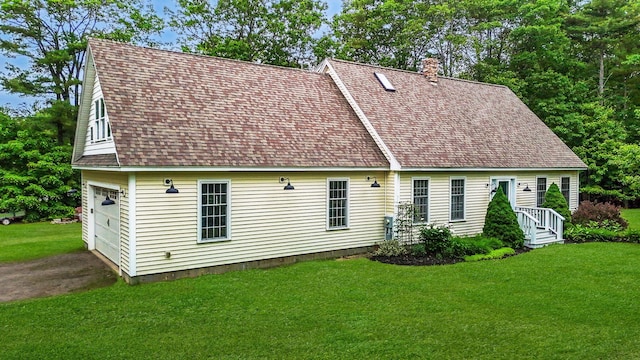 176 Weeks Rd, Gorham, ME 04038 - back of property with a chimney, roof with shingles, a yard, and driveway