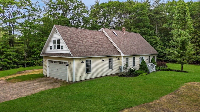 176 Weeks Rd, Gorham, ME 04038 - view of front of property with a chimney, driveway, a front yard, and roof with shingles