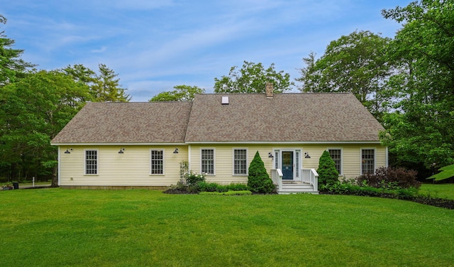 176 Weeks Rd, Gorham, ME 04038 - view of front of property with a front yard, a chimney, and a shingled roof