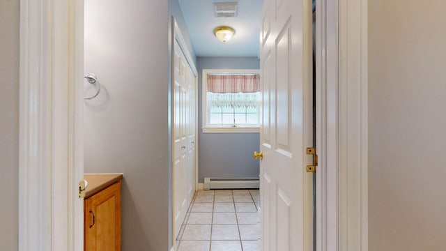 176 Weeks Rd, Gorham, ME 04038 - bathroom with a baseboard heating unit, tile patterned floors, and vanity