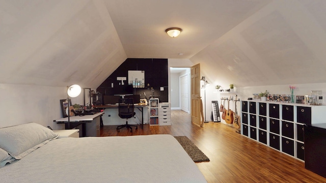 176 Weeks Rd, Gorham, ME 04038 - bedroom with vaulted ceiling, wood finished floors, and an office area