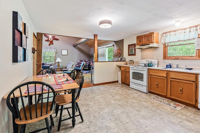 125 Lone Indian Trl, Augusta, ME 04330 - kitchen with electric range, a sink, and healthy amount of natural light