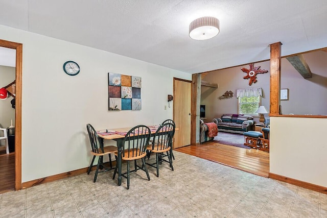 125 Lone Indian Trl, Augusta, ME 04330 - dining area featuring baseboards, tile patterned floors, and a textured ceiling
