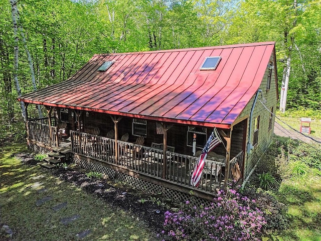 125 Lone Indian Trl, Augusta, ME 04330 - view of front of home with a standing seam roof and metal roof