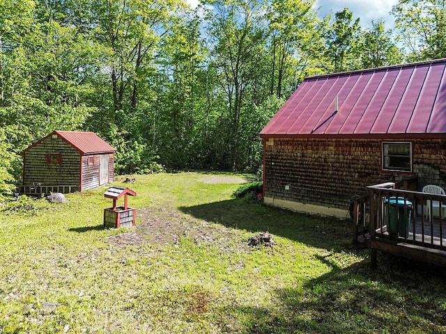 125 Lone Indian Trl, Augusta, ME 04330 - view of green lawn with a wooden deck