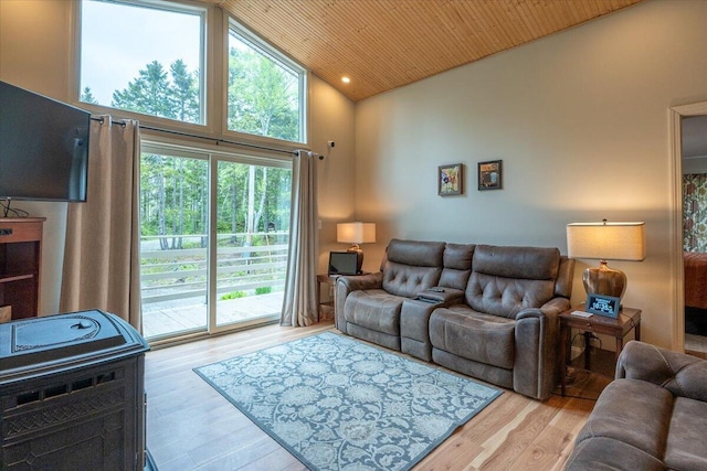 144 Woody Ln, Cushing, ME 04563 - living room featuring high vaulted ceiling, wood finished floors, and wood ceiling