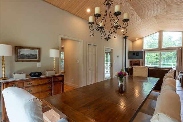 144 Woody Ln, Cushing, ME 04563 - dining space featuring high vaulted ceiling, wooden ceiling, a chandelier, and light wood-type flooring