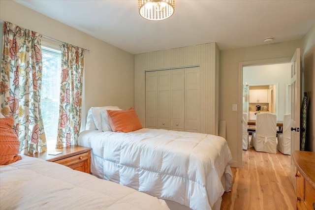 144 Woody Ln, Cushing, ME 04563 - bedroom with light wood-type flooring and a closet
