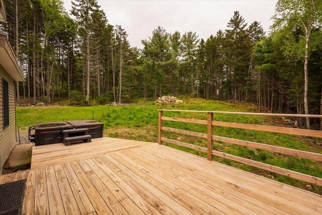 144 Woody Ln, Cushing, ME 04563 - deck featuring a wooded view