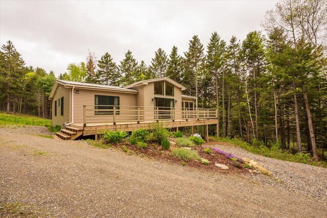 144 Woody Ln, Cushing, ME 04563 - view of front of home with a deck