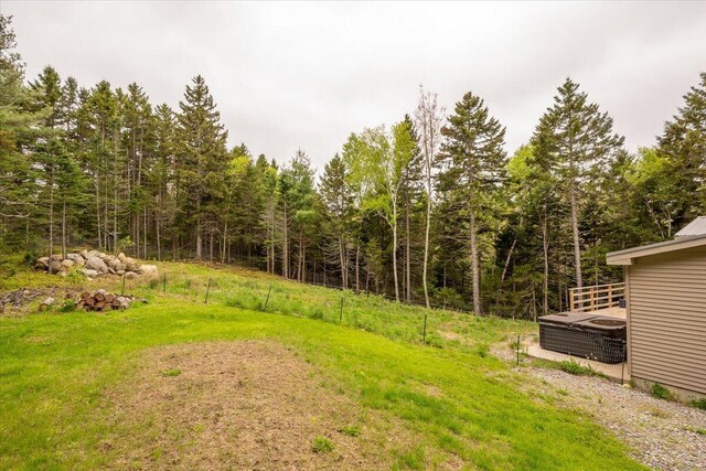 144 Woody Ln, Cushing, ME 04563 - view of green lawn featuring a view of trees