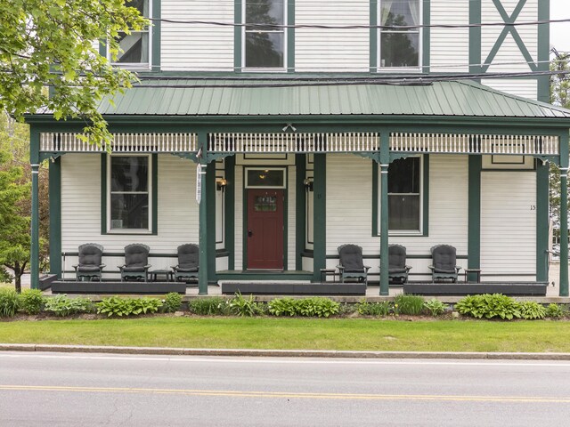 15 Mill Hl Unit 2B, Bethel, ME 04217 - view of front of house featuring a porch and metal roof