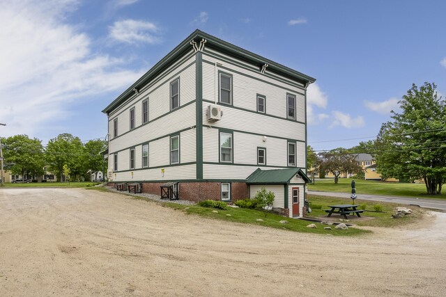 15 Mill Hl Unit 2B, Bethel, ME 04217 - view of building exterior with a wall mounted AC
