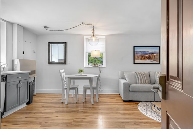 15 Mill Hl Unit 2B, Bethel, ME 04217 - dining space featuring light wood-style flooring and baseboards