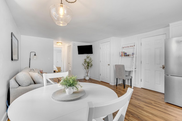 15 Mill Hl Unit 2B, Bethel, ME 04217 - dining area featuring light wood-style floors