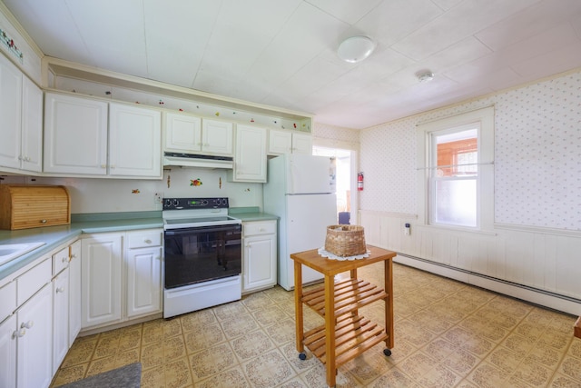 33 Neally St, South Berwick, ME 03908 - kitchen featuring white appliances, under cabinet range hood, wallpapered walls, wainscoting, and a baseboard heating unit