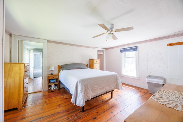 33 Neally St, South Berwick, ME 03908 - bedroom featuring wallpapered walls, hardwood / wood-style floors, and a ceiling fan