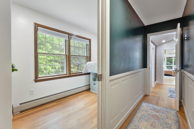39 Solomon Dr, Gorham, ME 04038 - corridor with baseboard heating, light wood-style flooring, plenty of natural light, lofted ceiling, and wainscoting