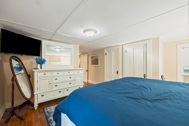 75 Ledgelawn Ave, Bar Harbor, ME 04609 - bedroom featuring baseboards and dark wood-style floors