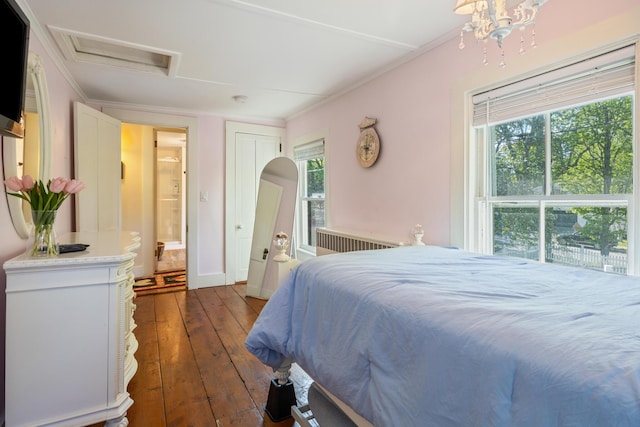 75 Ledgelawn Ave, Bar Harbor, ME 04609 - bedroom featuring crown molding, dark wood finished floors, and attic access