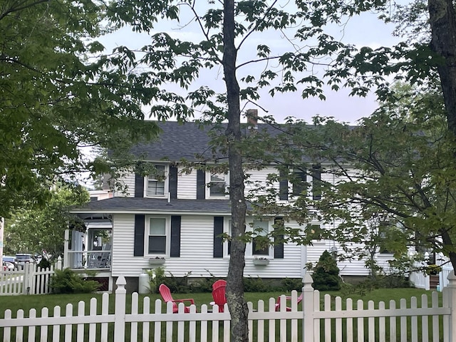 75 Ledgelawn Ave, Bar Harbor, ME 04609 - view of front of property with a fenced front yard and roof with shingles