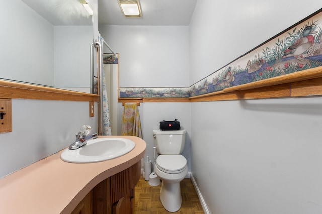 165 Temple Ave Unit 1, Old Orchard Beach, ME 04064 - full bathroom featuring toilet, vanity, baseboards, and a shower with curtain