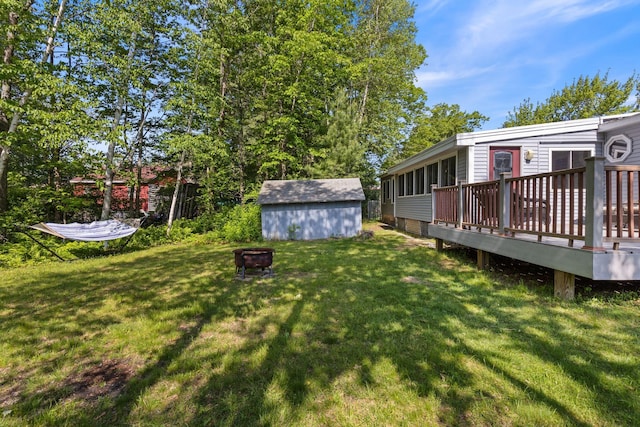 165 Temple Ave Unit 1, Old Orchard Beach, ME 04064 - view of grassy yard with a fire pit and a deck