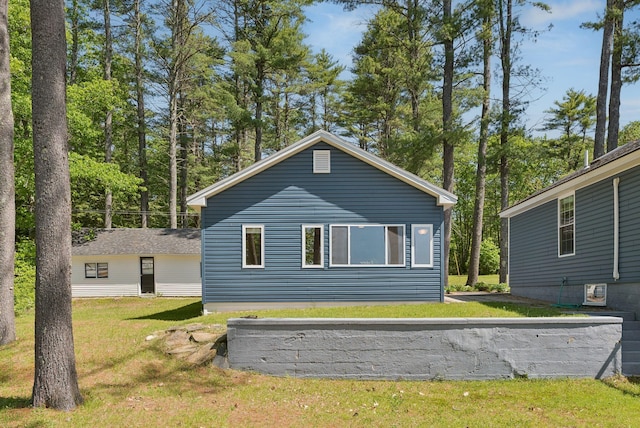 31 Middle Rd, Acton, ME 04001 - back of house featuring a lawn