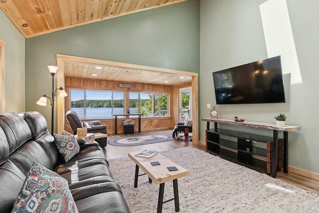 31 Middle Rd, Acton, ME 04001 - living room featuring wood finished floors, plenty of natural light, wooden ceiling, baseboards, and high vaulted ceiling