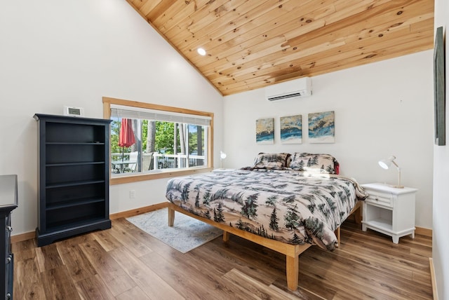31 Middle Rd, Acton, ME 04001 - bedroom with a wall mounted air conditioner, wood ceiling, baseboards, wood finished floors, and high vaulted ceiling