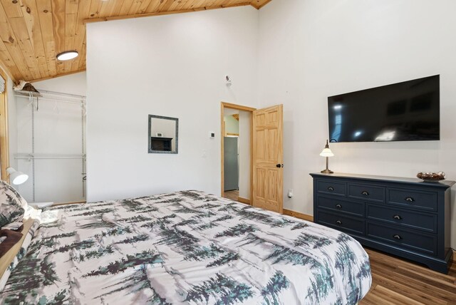 31 Middle Rd, Acton, ME 04001 - bedroom featuring vaulted ceiling, wood ceiling, and wood finished floors