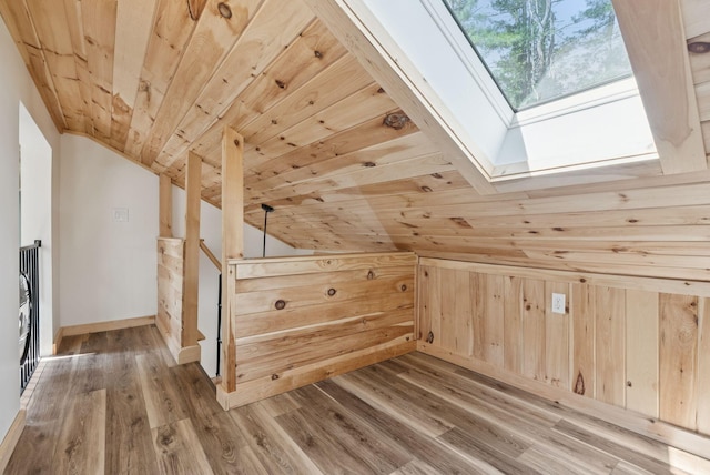 31 Middle Rd, Acton, ME 04001 - additional living space featuring vaulted ceiling, wooden ceiling, wood finished floors, a skylight, and baseboards