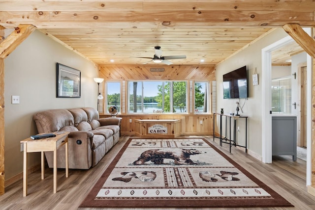 31 Middle Rd, Acton, ME 04001 - living room with wooden ceiling, wood finished floors, healthy amount of natural light, and ceiling fan