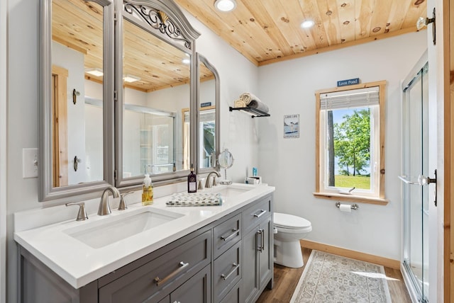 31 Middle Rd, Acton, ME 04001 - bathroom with wooden ceiling, recessed lighting, a shower stall, wood finished floors, and double vanity