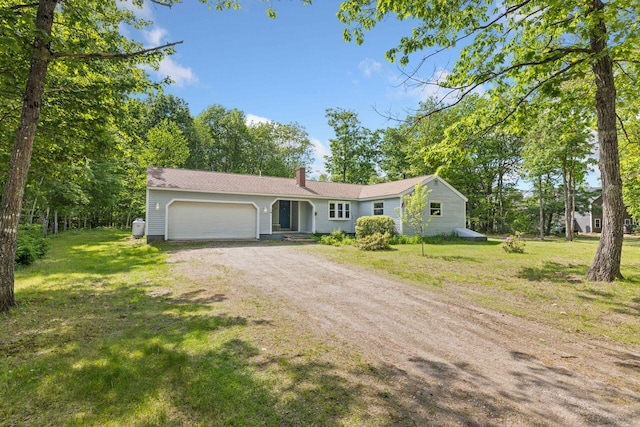 16 Van Buren Dr, Newfield, ME 04095 - ranch-style house with dirt driveway, an attached garage, a front yard, and a chimney