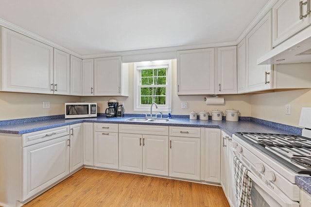 16 Van Buren Dr, Newfield, ME 04095 - kitchen with white appliances, a sink, extractor fan, white cabinetry, and dark countertops