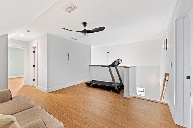 12 Haleys Ct Unit 21, Wells, ME 04090 - workout area featuring ceiling fan, light wood finished floors, and baseboards