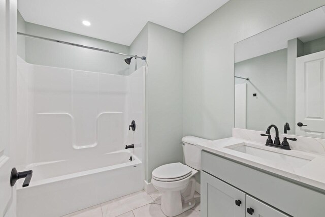 12 Haleys Ct Unit 21, Wells, ME 04090 - bathroom featuring toilet, vanity, and shower / washtub combination