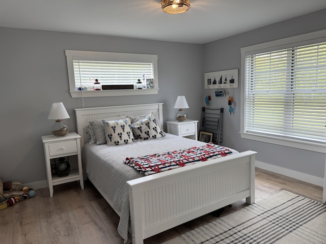 588 Mason Bay Rd, Jonesport, ME 04649 - bedroom with wood finished floors and baseboards