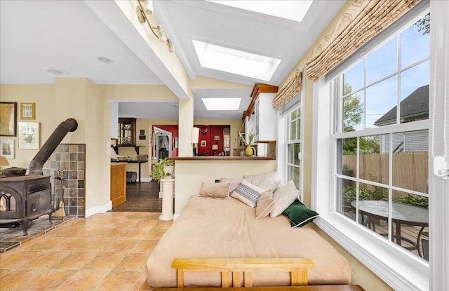 44 Bridge St, Bucksport, ME 04416 - interior space featuring a skylight, lofted ceiling, and baseboards