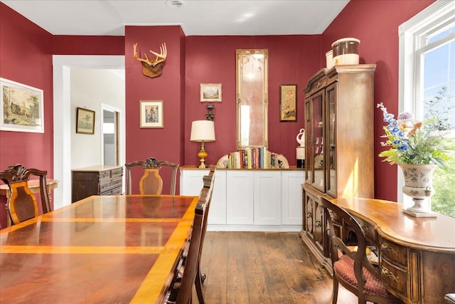 44 Bridge St, Bucksport, ME 04416 - dining room with dark wood-type flooring and plenty of natural light