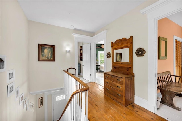 44 Bridge St, Bucksport, ME 04416 - corridor with an upstairs landing and light wood finished floors