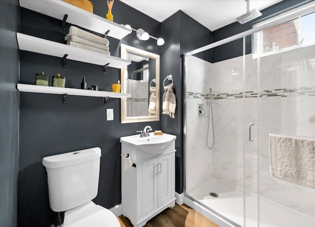44 Bridge St, Bucksport, ME 04416 - bathroom featuring a marble finish shower, toilet, and vanity